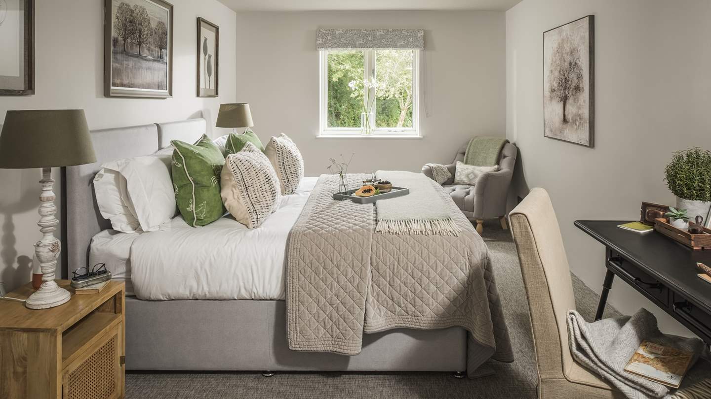 Bedroom three is a rustic haven, offering the addition of a desk space