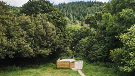 Set amidst breath-taking surroundings, sink into the heavenly hot tub