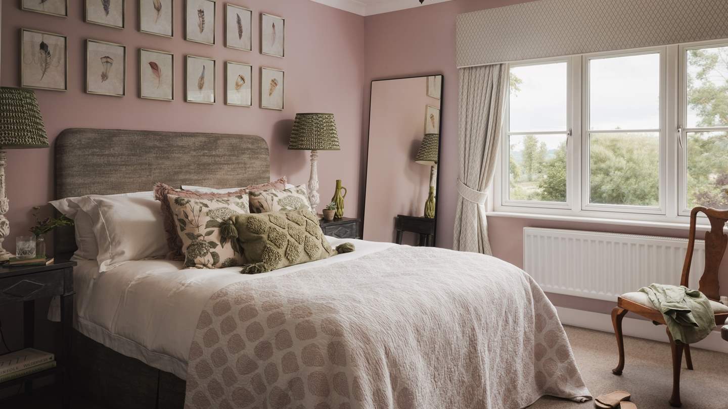 Within the soothing shades of bedroom three resides a sumptuous king size bed
