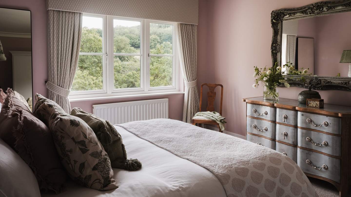 Pretty pinks are pared with pretty antique pieces to create this beautiful abode 
