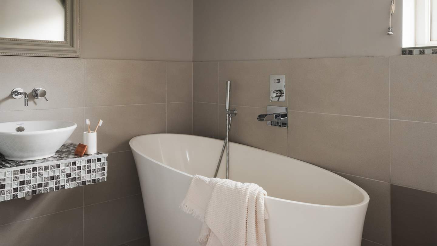 Bedrooms three and four both share the bathroom opposite...