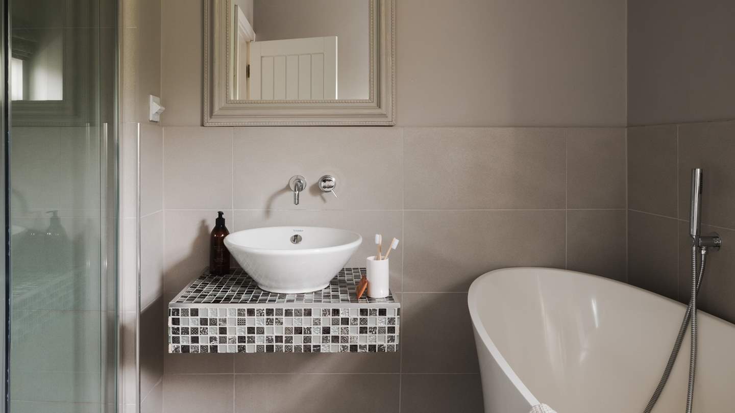 Which holds a deep freestanding bath and separate shower