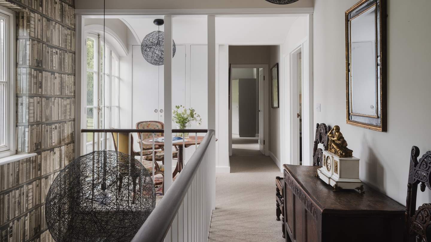 The grand landing leads to four sumptuous bedrooms