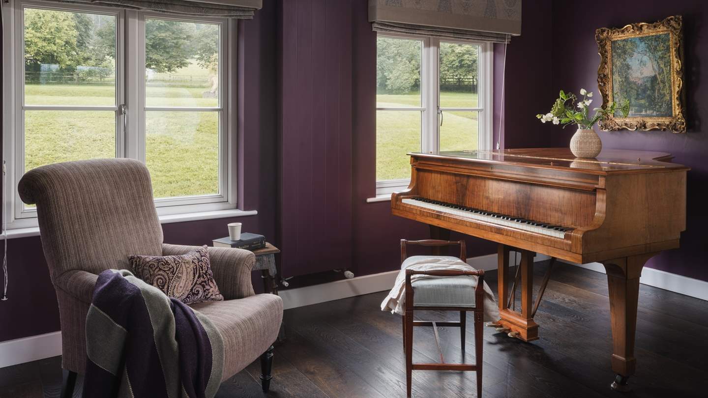 The grand piano, perfect for Christmas carols or for any occasion that calls for a singalong!