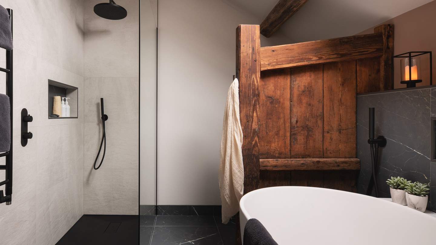 The large walk in shower is also big enough for two