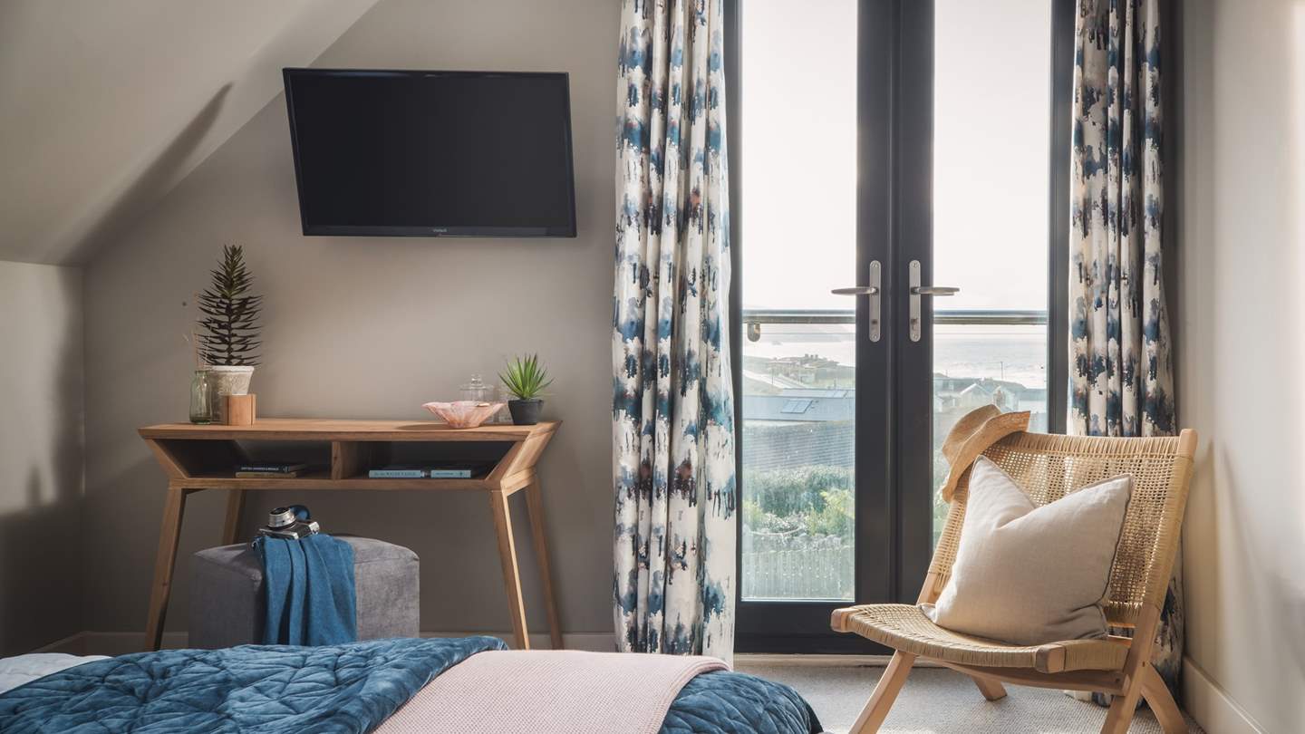 On hot nights, open the pretty Juliet balcony to let the soft sea breeze gently help you fall asleep