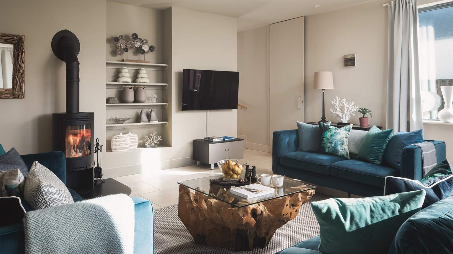 The cosy wood burner keeps you toasty warm during cooler months