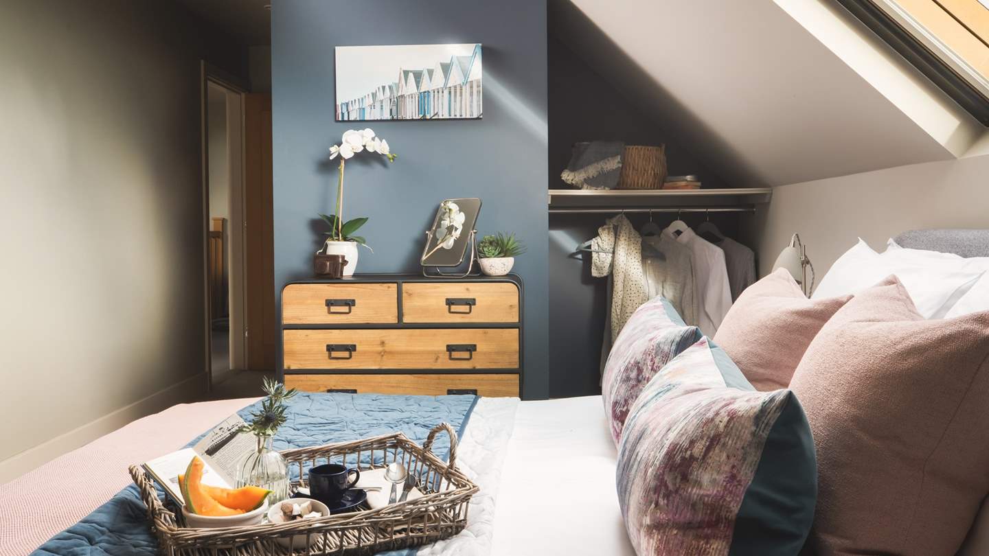The sumptuous king-sized bed in the master bedroom is just made for long lie ins, whilst there’s a chest of drawers and hanging space for clothes