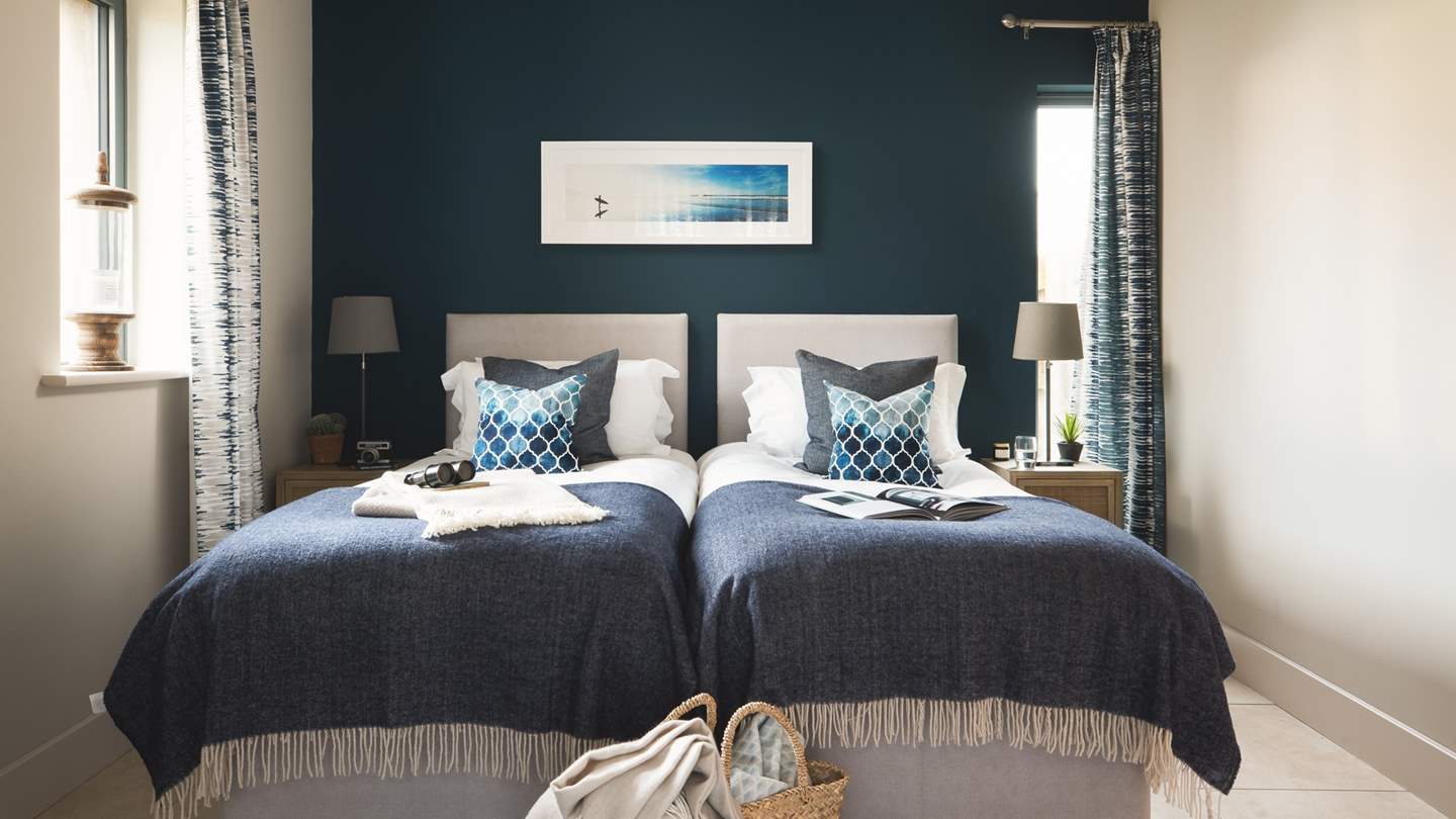 The ground floor bedroom is a zip and link, meaning it can be made up as a king size bed or twins