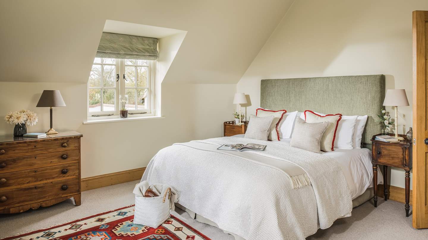 The second bedroom also has a comfy king-sized bed and comes complete with an en suite bath with overhead shower.