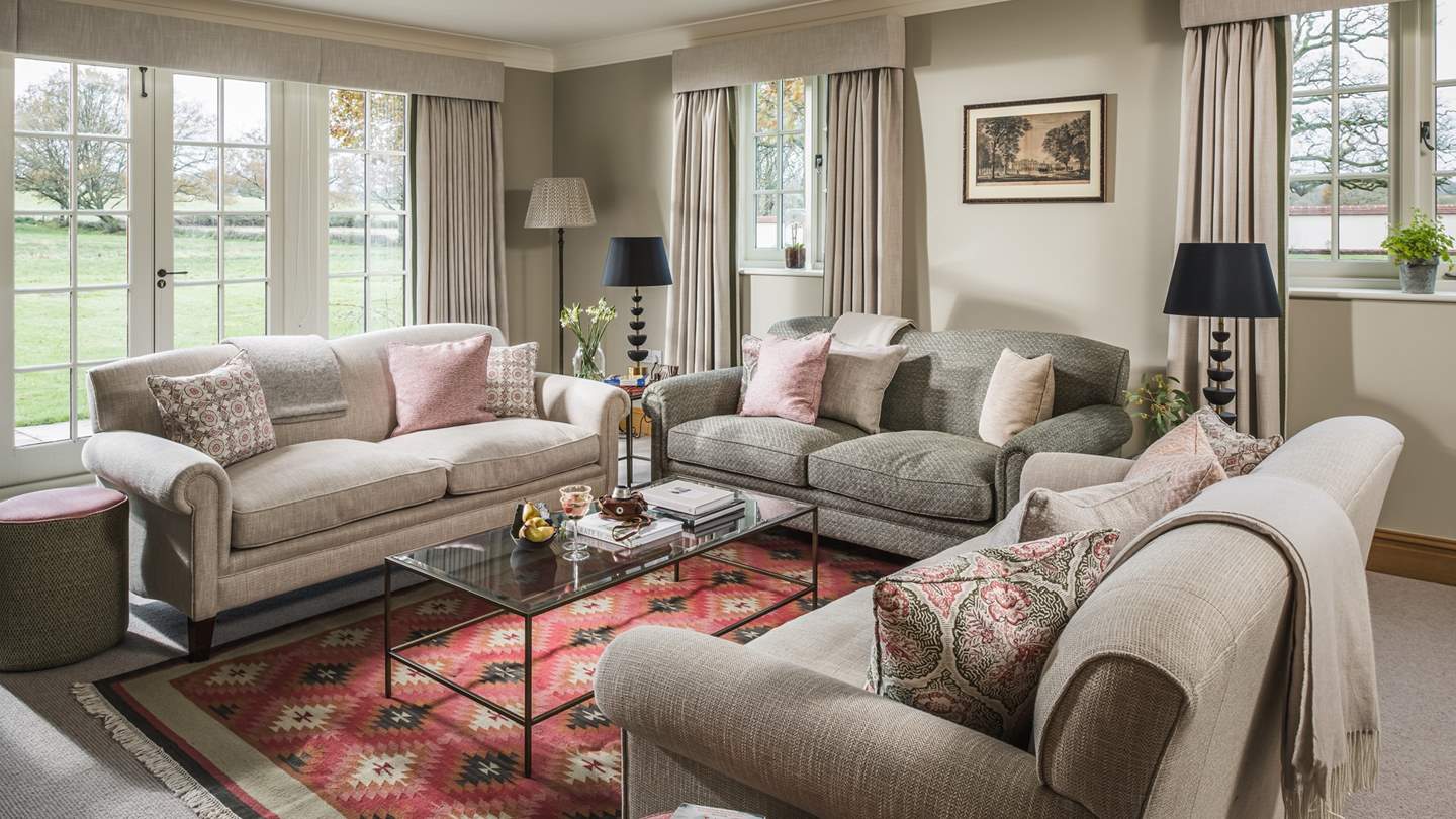 This lovely sitting room, complete with wood burner, is a dream to return to at the end of a busy day exploring