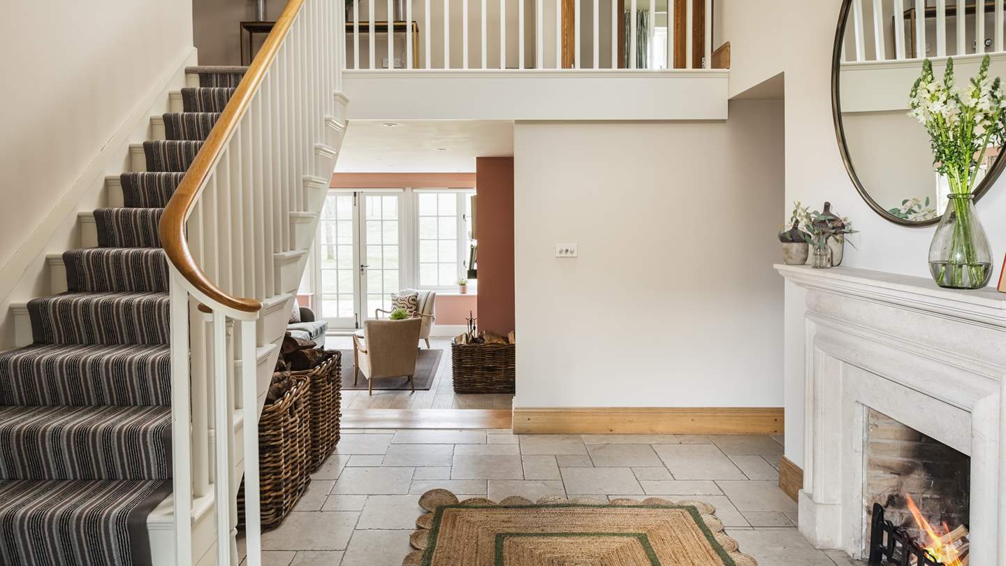 The welcoming entrance hall, with gorgeous open fire