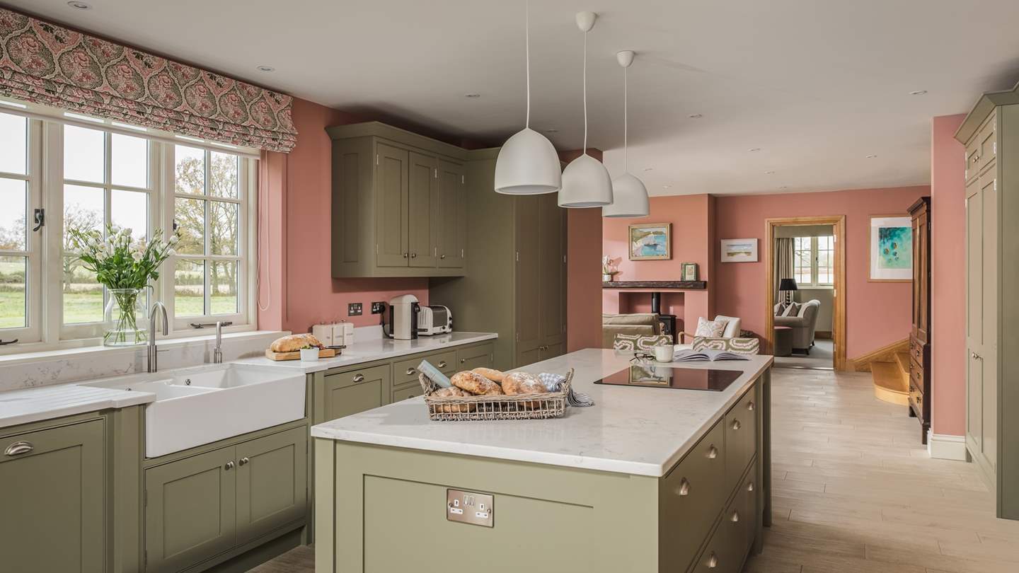 The spacious kitchen is fully equipped with everything a keen cook might need