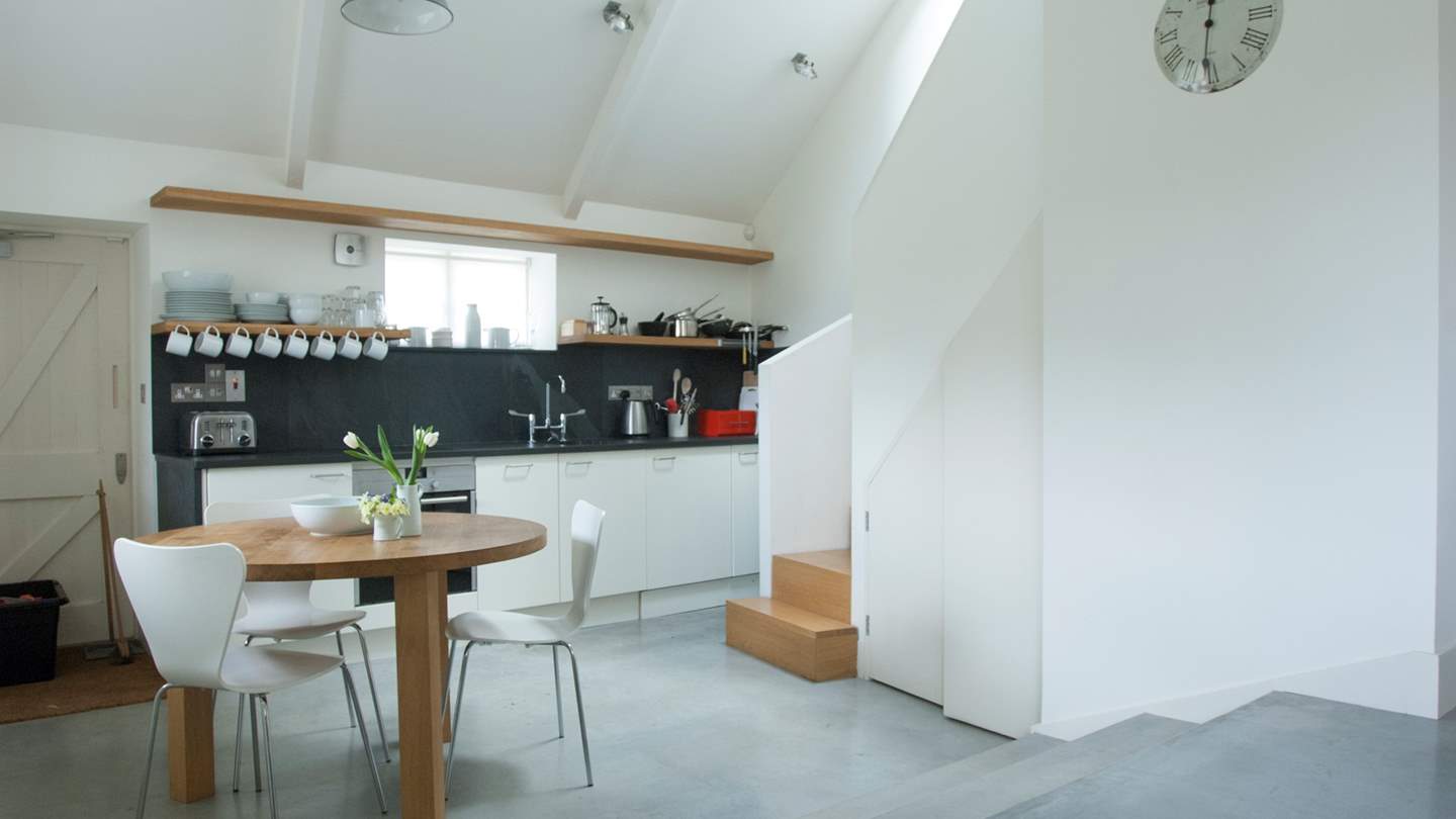 There is a kitchen/dining area so you can prepare breakfast and snacks to your heart's content and stairs up to an en suite bedroom