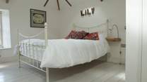 A pretty double bedroom with en suite shower room