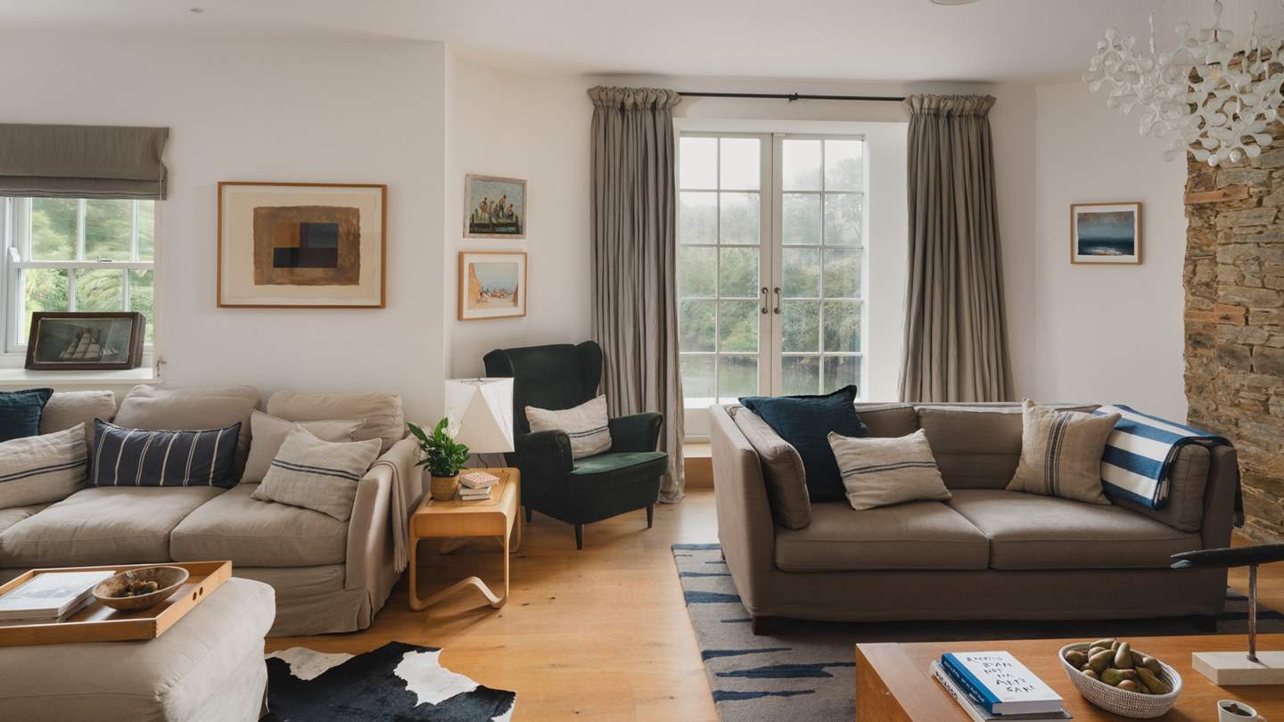 The sumptuous sitting room offers plenty of seating for everyone to get together and relax