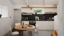 Contemporary, with modern touches, the kitchen is a wonderful space to prepare meals