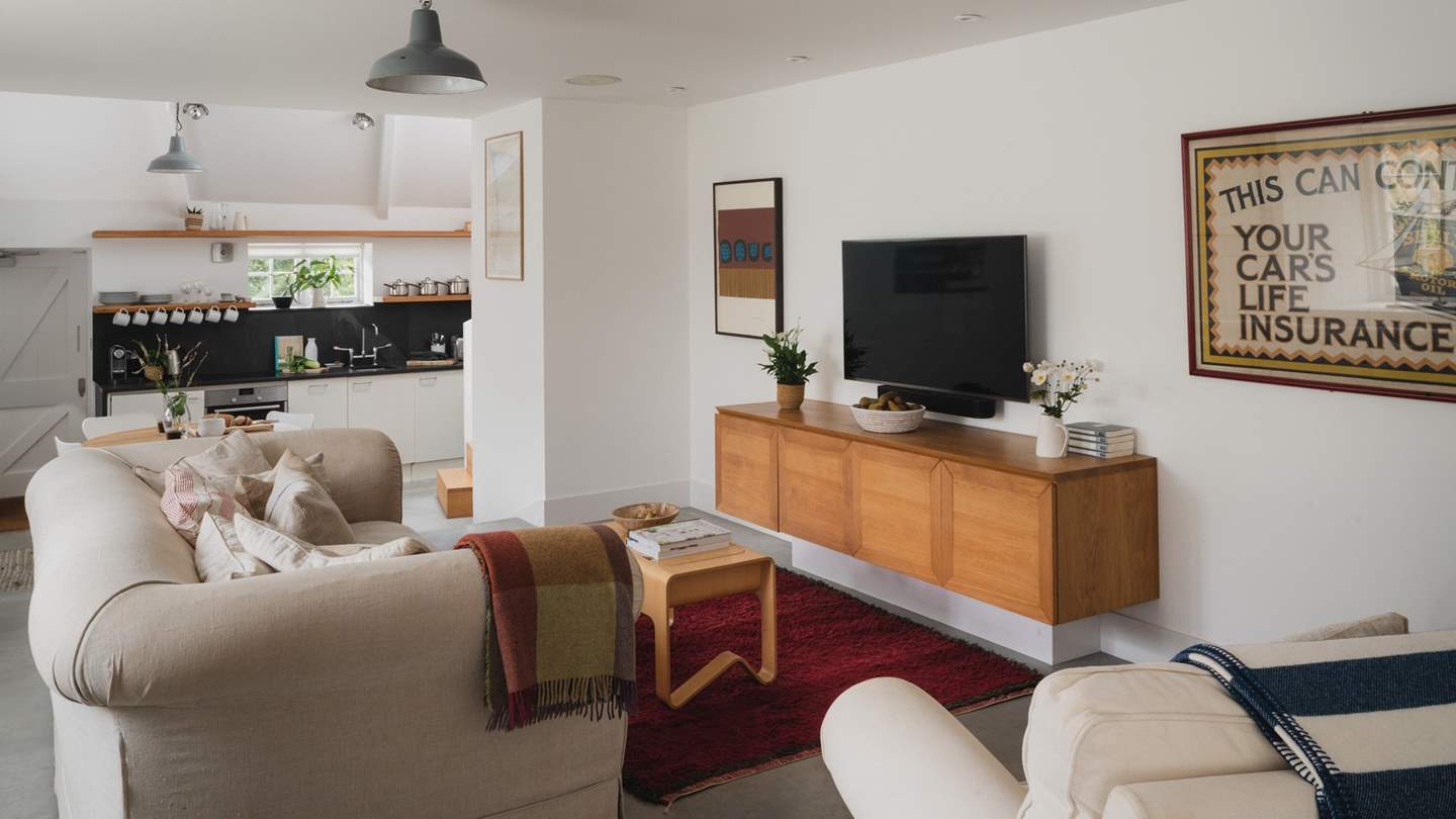 The Coach House's open plan living room has a fully fitted kitchen/dining area so you can prepare breakfast and snacks for your loved-ones 