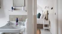 The en suite is handily  just a few short steps from the bed