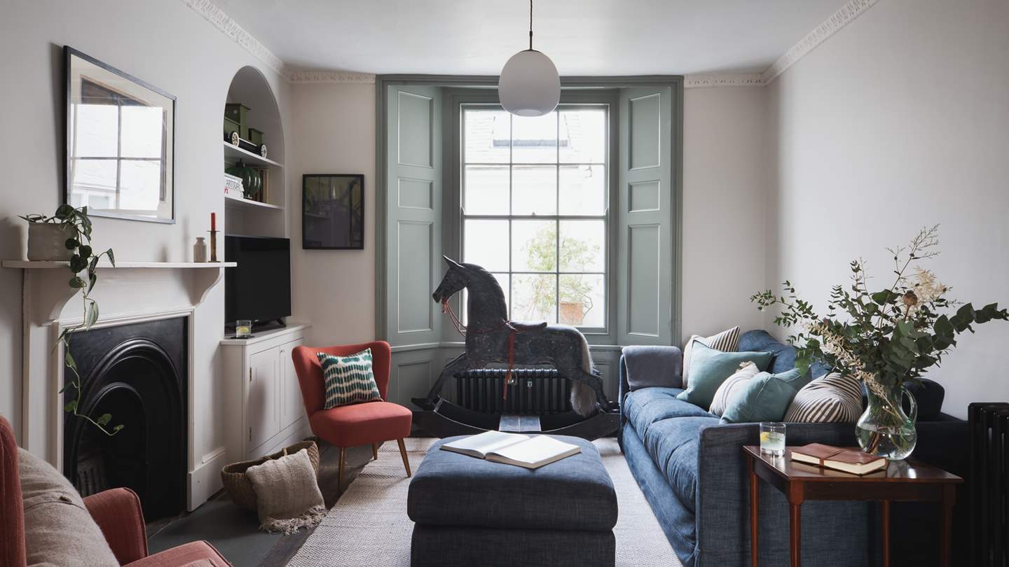 The pretty second sitting room, complete with antique rocking horse