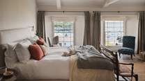 With sea views from both windows, you can watch the boats and ferries float by from the comfort of your bed