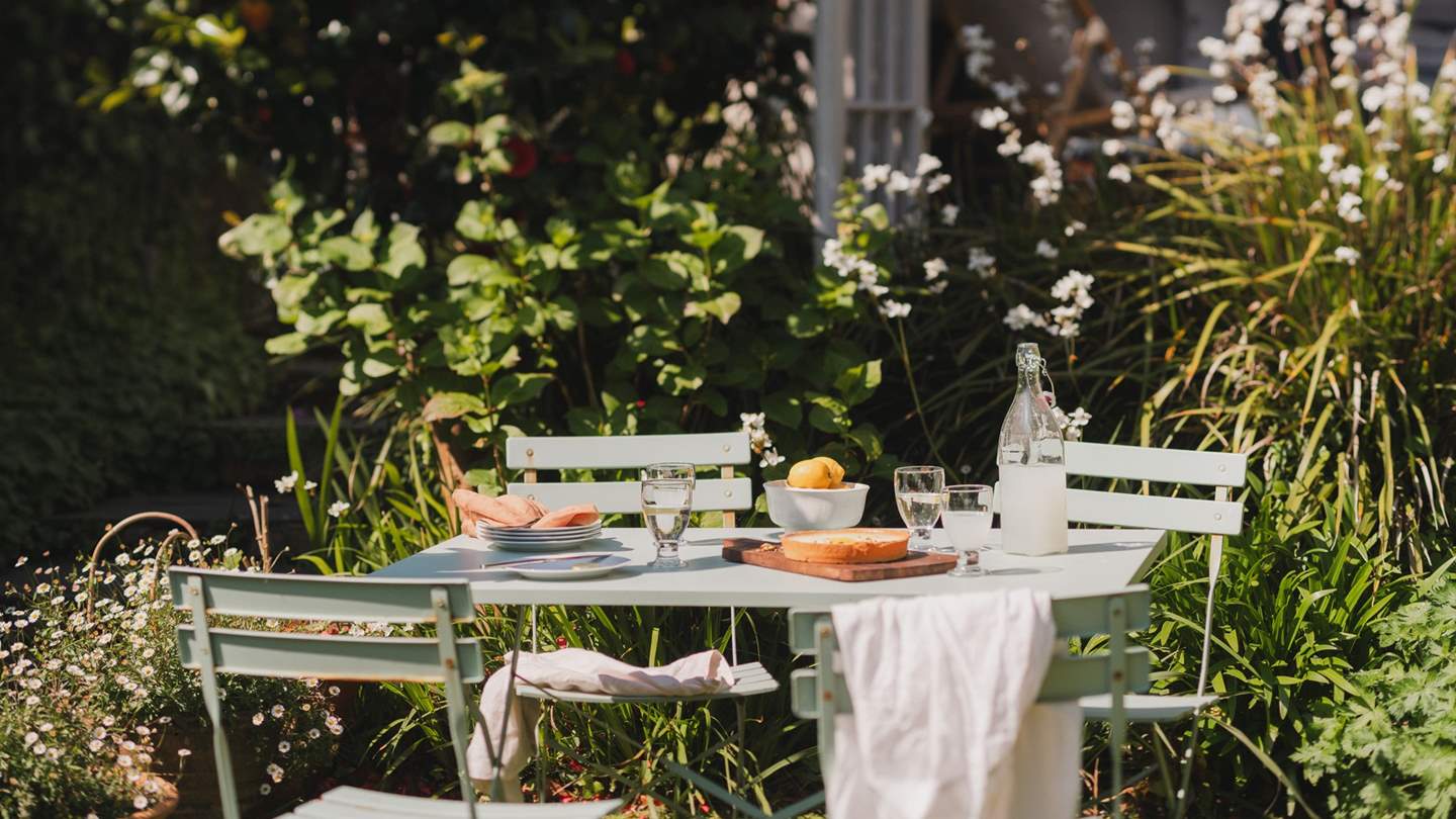 In summer, hydrangeas and other flowers bring brilliant colour to the well established garden