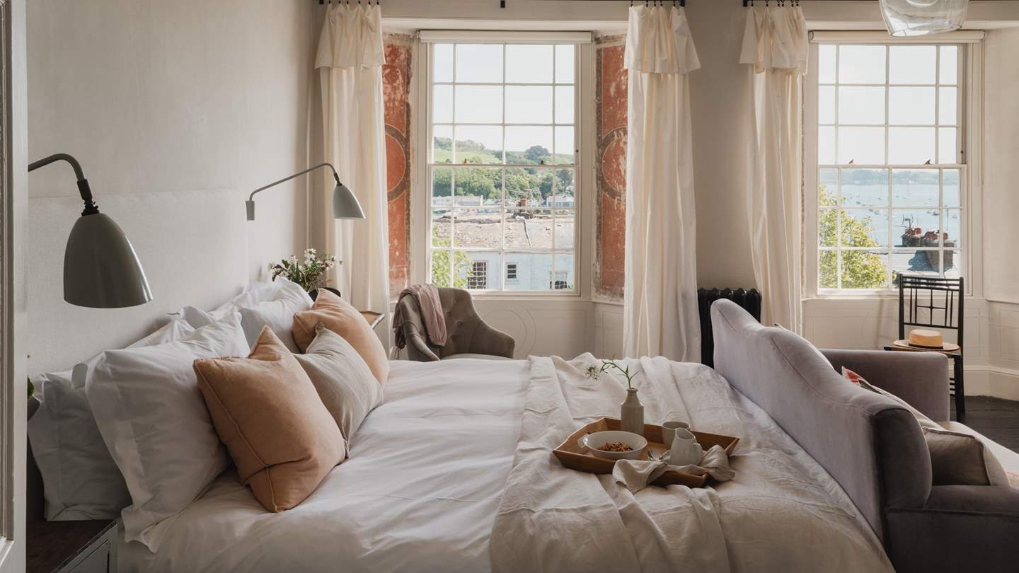 The stunning velvet sofa and beautifully patinated wooden floors are simply divine...