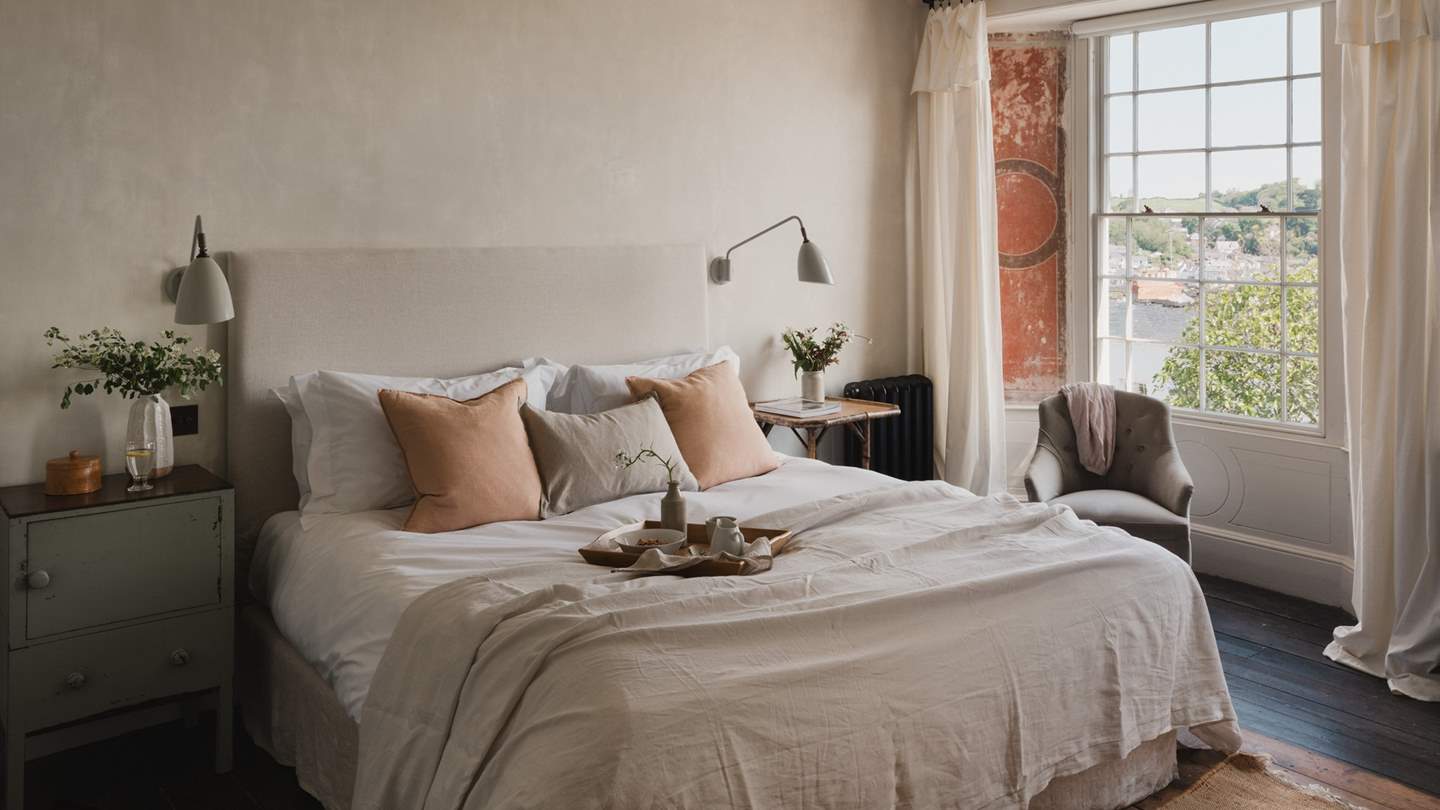 From here, you can gaze out of the two windows across the harbour, watching the hustle and bustle of boats going about their business