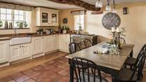 In Apple Blossom House, the country-style kitchen is full of character and beckons for homemade feasts