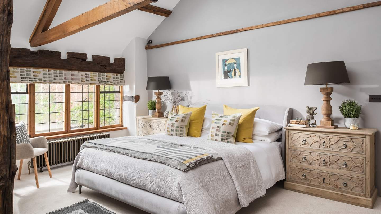 A winsome cottage retreat just idyllic for two, The Gallery presents a luxurious bedroom crowned with a vaulted, beamed ceiling