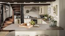 Settle down around the breakfast bar to savour meals or take a seat around the dedicated dining table for flavourful repasts


