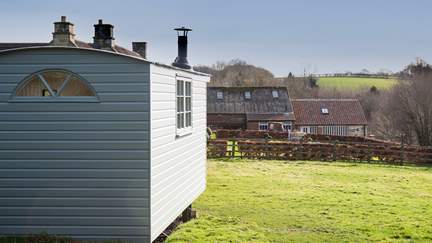 Nestled in the lush paddock there’s a charming shepherd’s hut to discover, complete with a wood burner