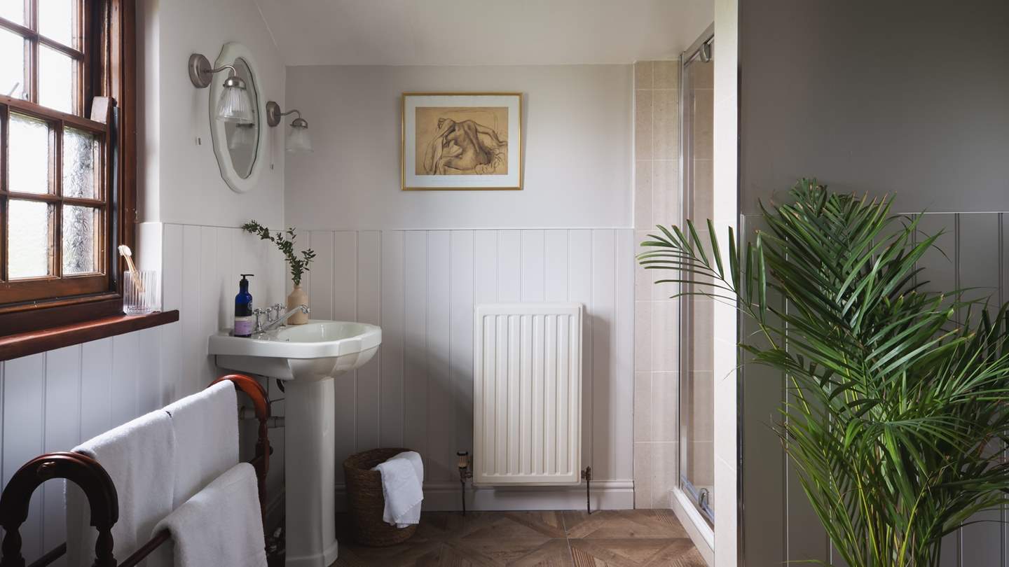 The oh-so-charming family shower room