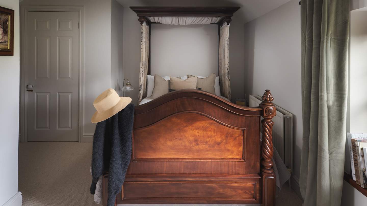 The second bedroom is home to a gorgeous antique bed...bliss