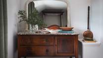 We adore this eye-catching dressing table with antique marble top