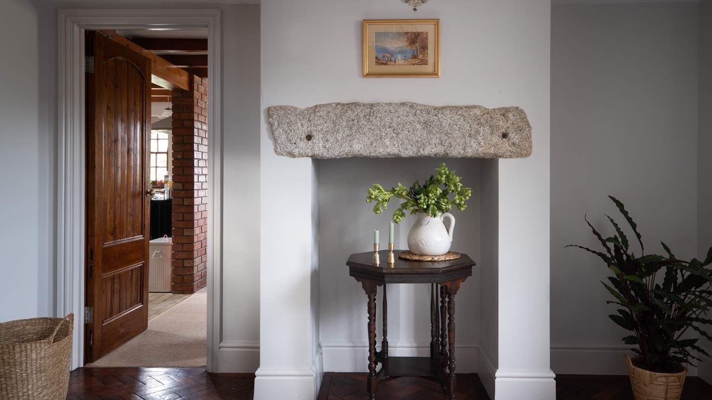 We just love the original features such as the parquet flooring and huge stone lintel 