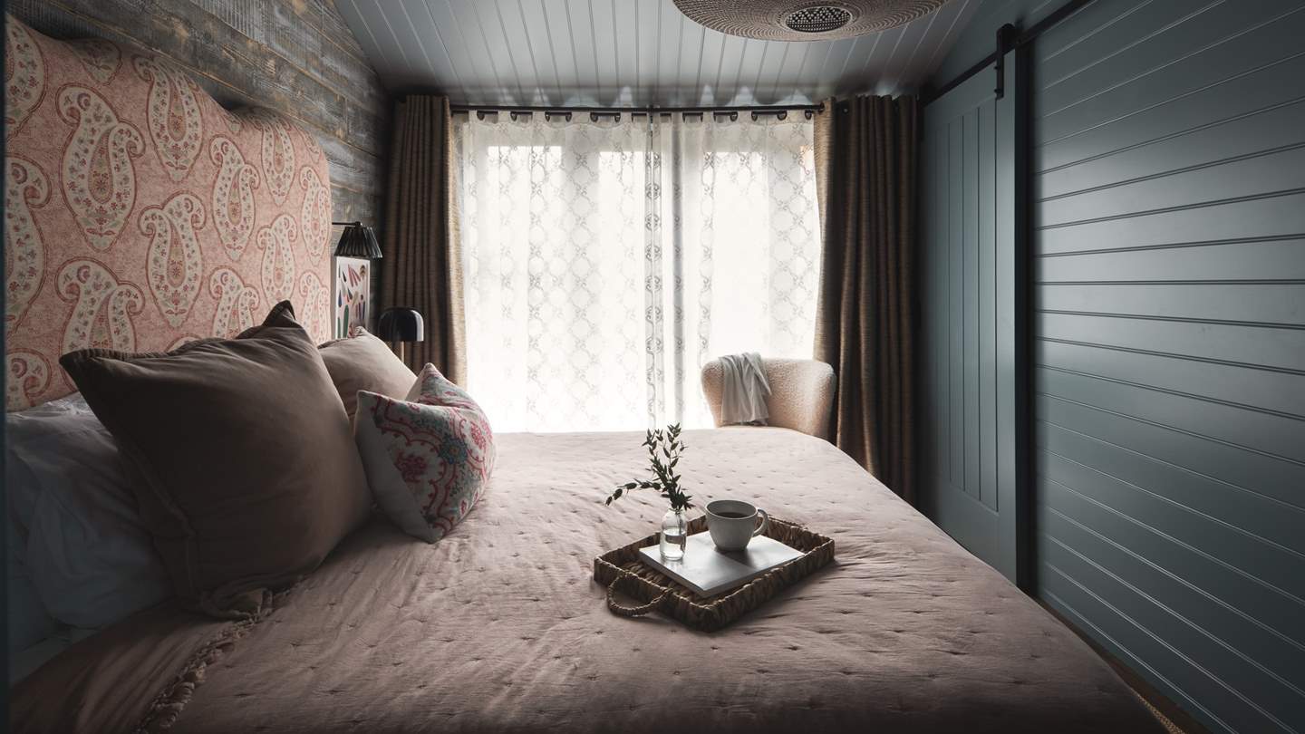 The  prettiest bedroom awaits to help you slumber the night away