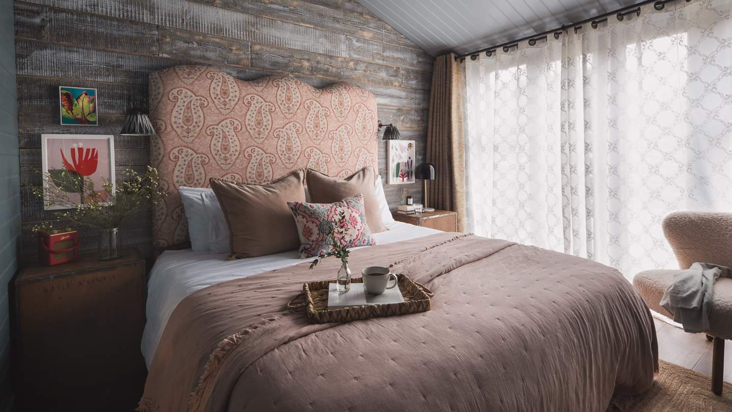 The gorgeous bedroom, with super king-sized bed, is the ultimate escape at the end of the day...
