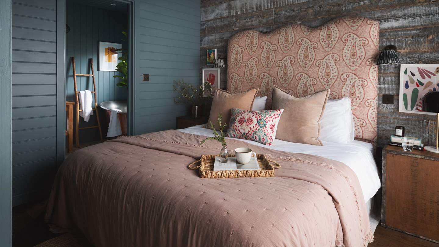 The en suite bath and shower room is only a couple of steps away