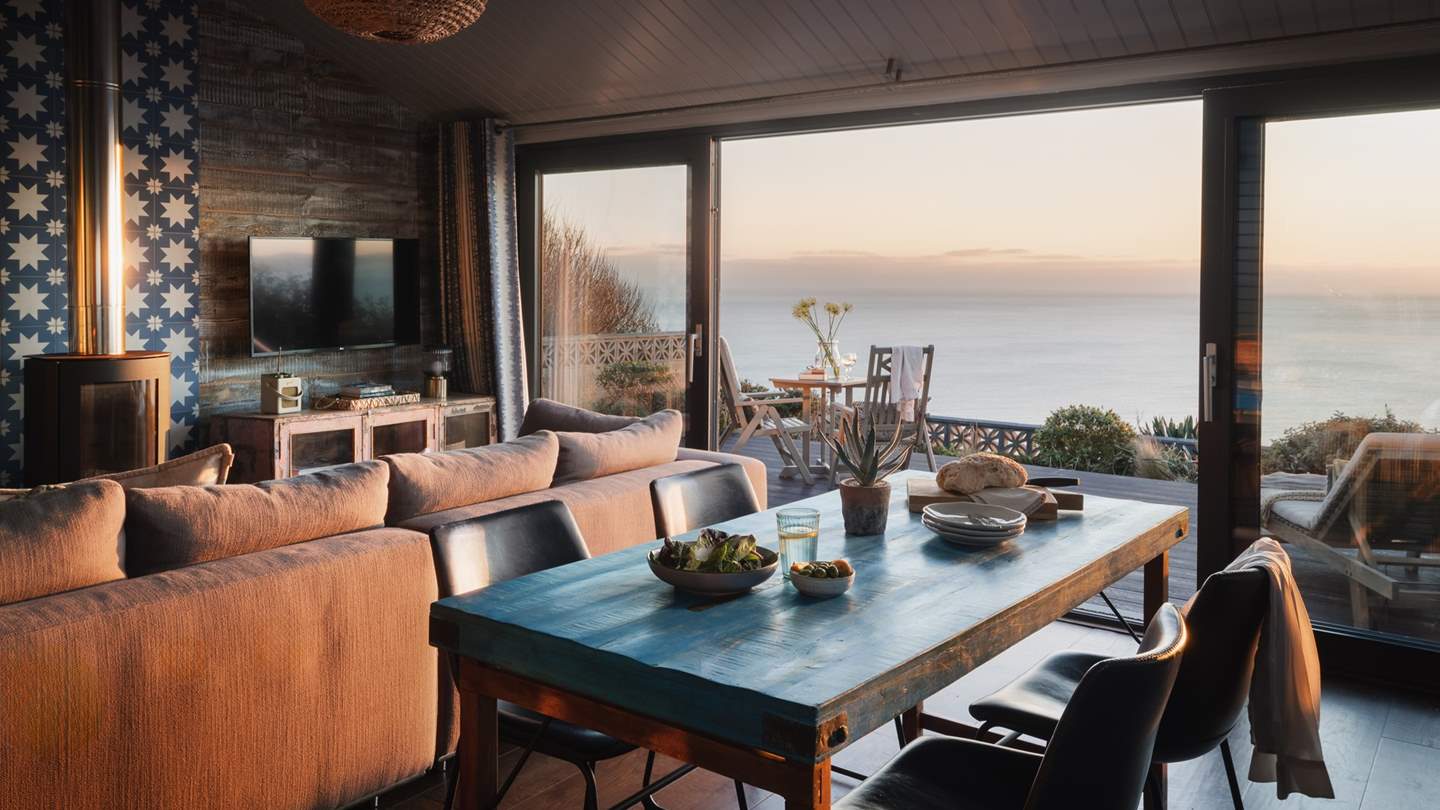 With open-plan living and floor-to-ceiling glass doors, the sea is never far away