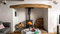 Cosy up by the roaring wood burner in the oak beamed sitting room