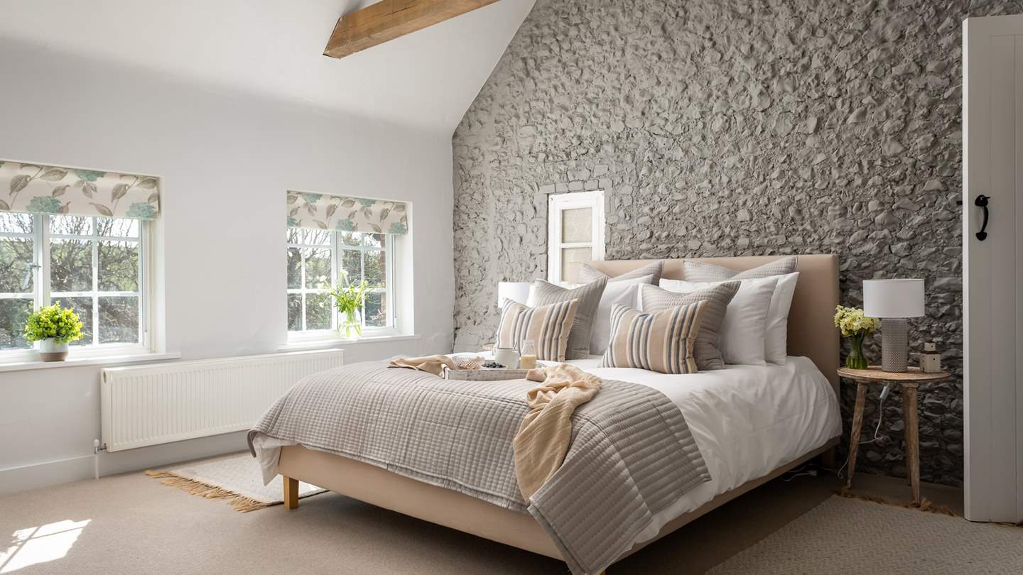 The bright and airy master bedroom, complete with a comfy king size bed 