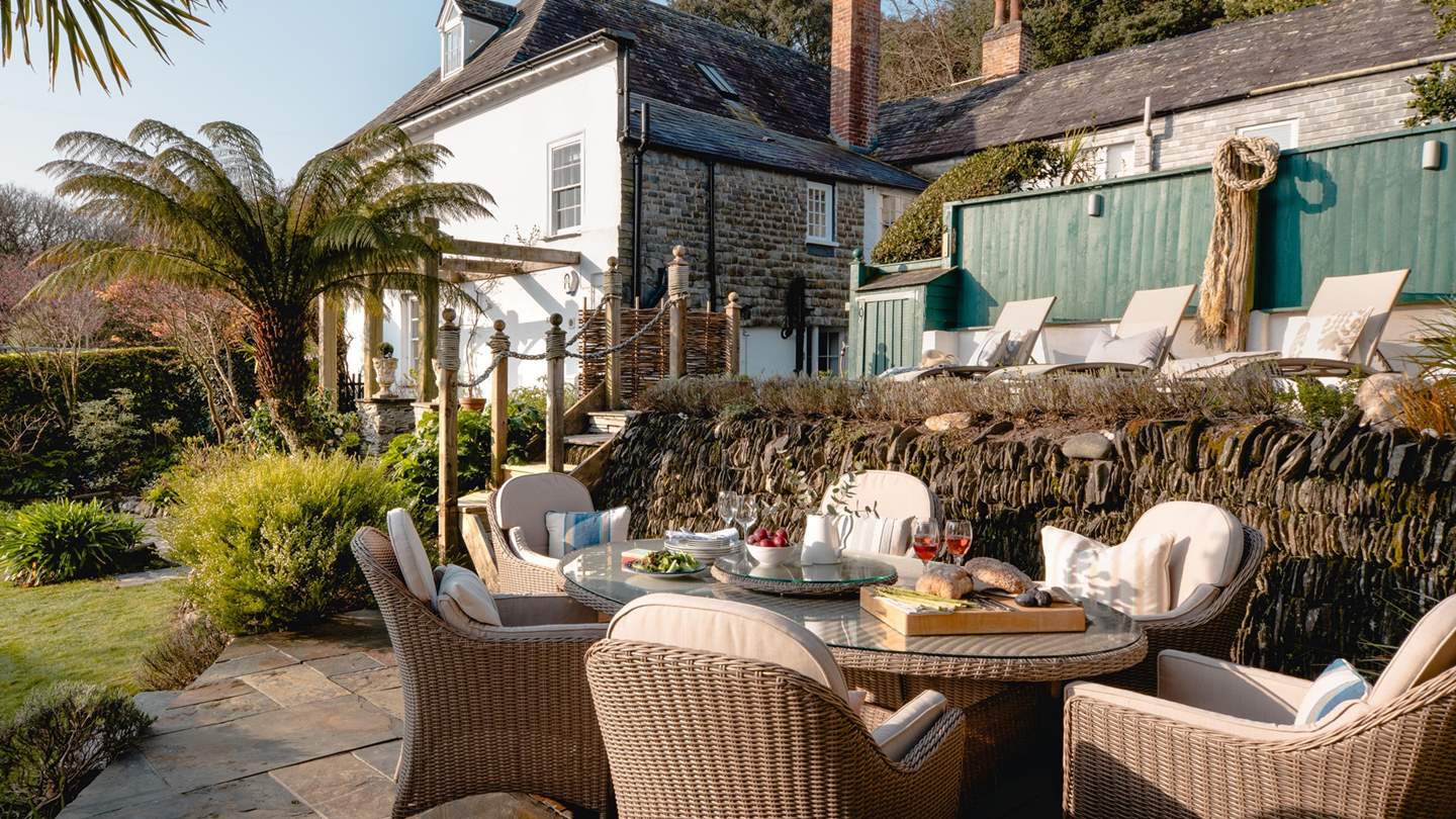 Enjoy balmy summer evenings around this dining table for eight