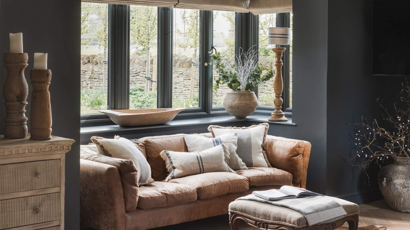 With beamed ceilings, herringbone wood floorboards and a touch of rustic romance of exposed golden stone 