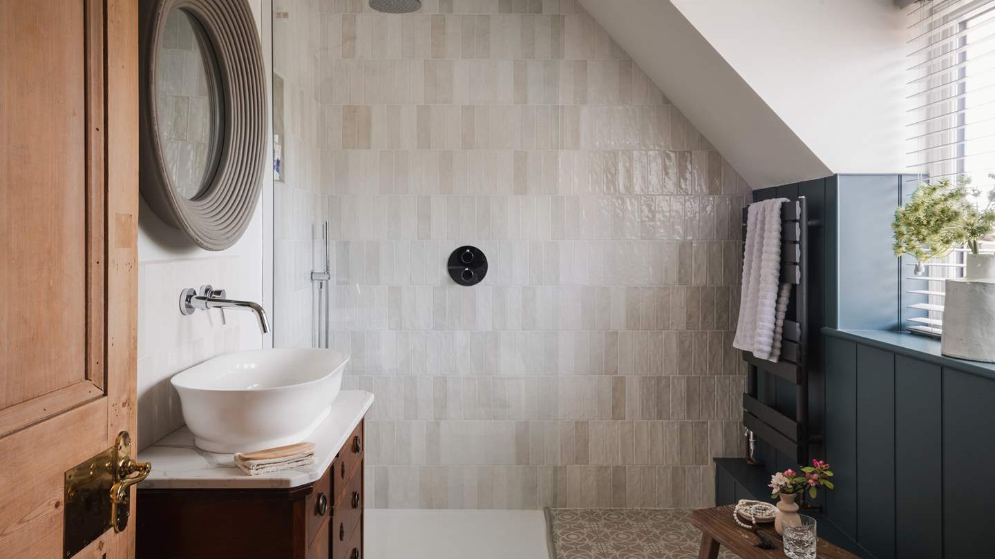 Discover the spacious family bathroom, with a walk-in rainfall shower for those wake-me-up morning moments