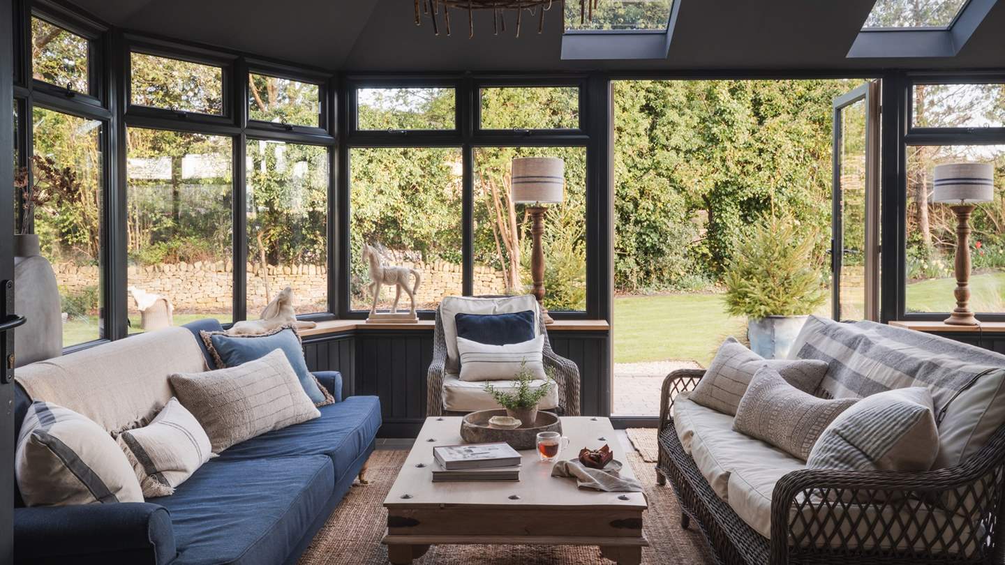 Bifold doors lead to the orangery, where a luxurious space awaits to welcome the outdoors in and relish a dose of country living