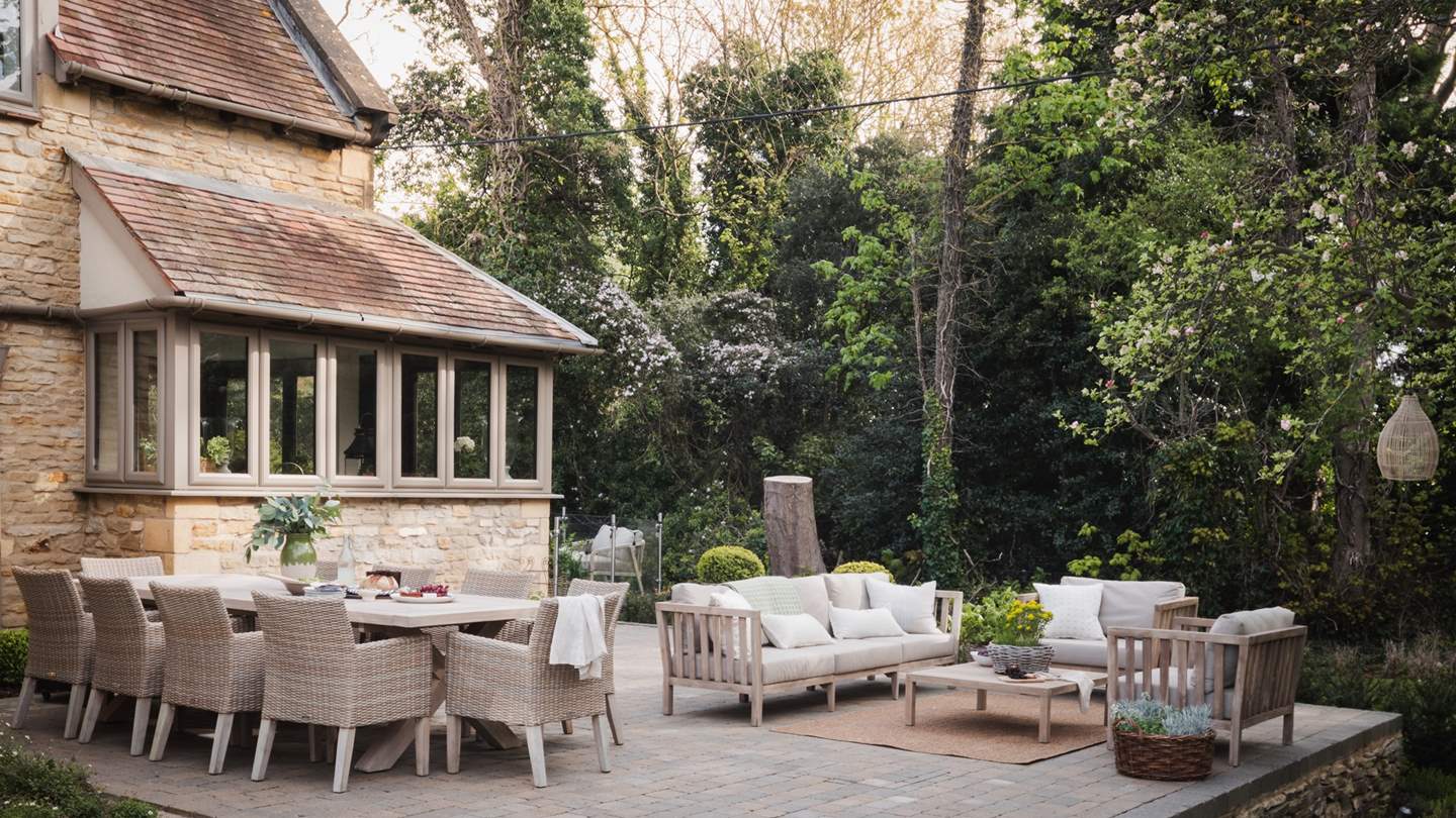 To the rear of the retreat lies a gorgeous garden with sun-soaked terrace leading from the orangery