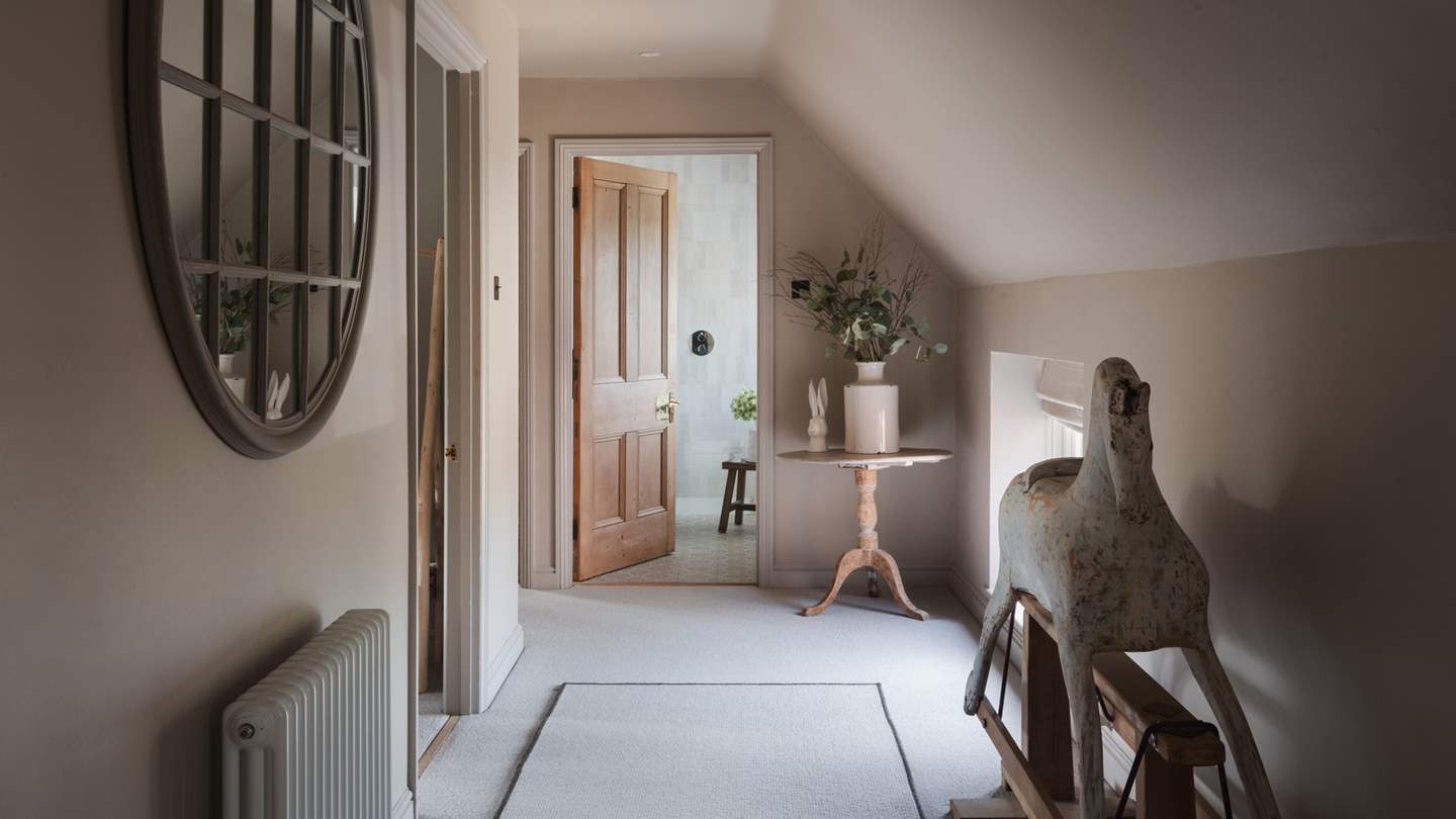 This elegant escape to the country promises chic interiors and rustic features in harmony with its unique setting, curating a calming retreat from reality