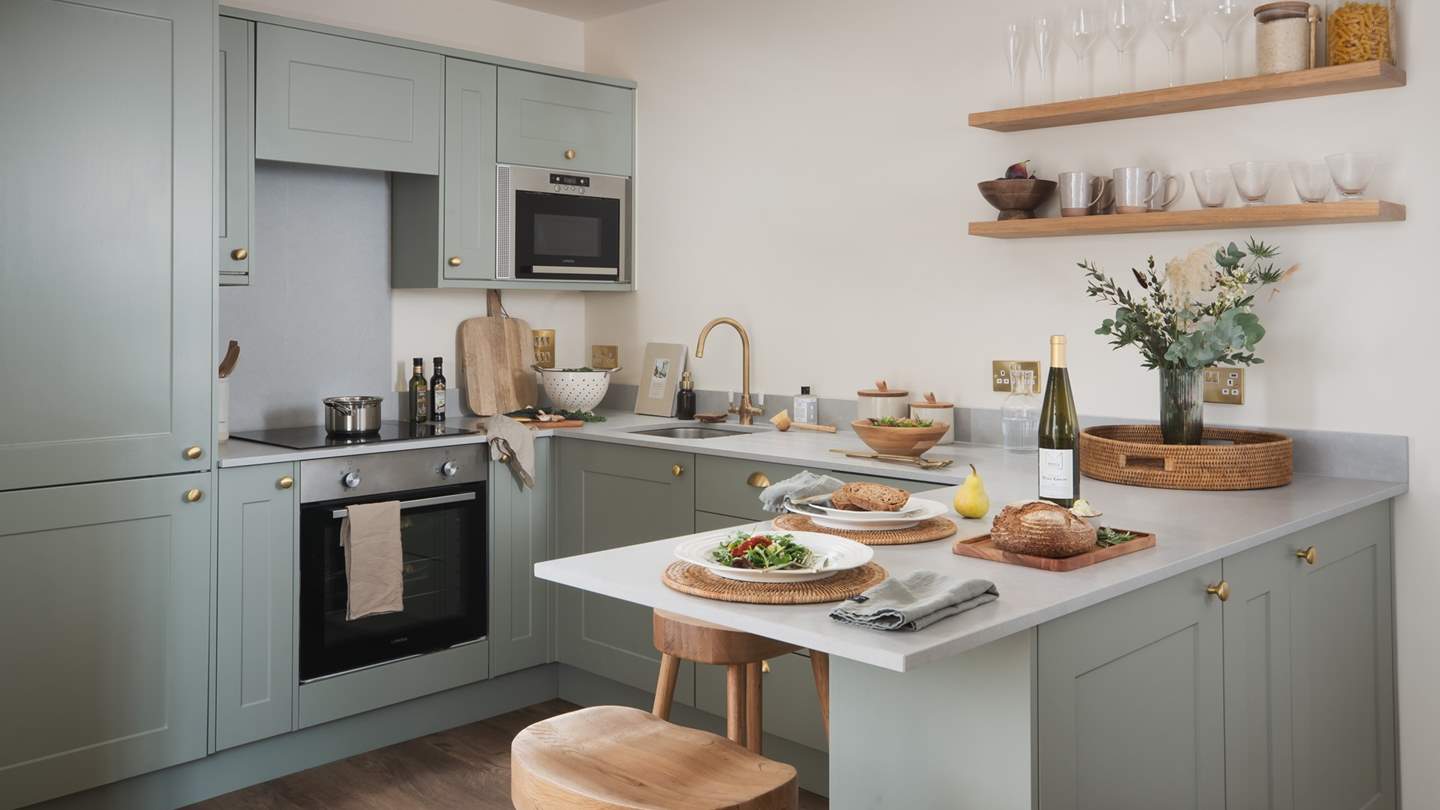 The stunning L-shaped kitchen has all you need to prepare a romantic feast for two