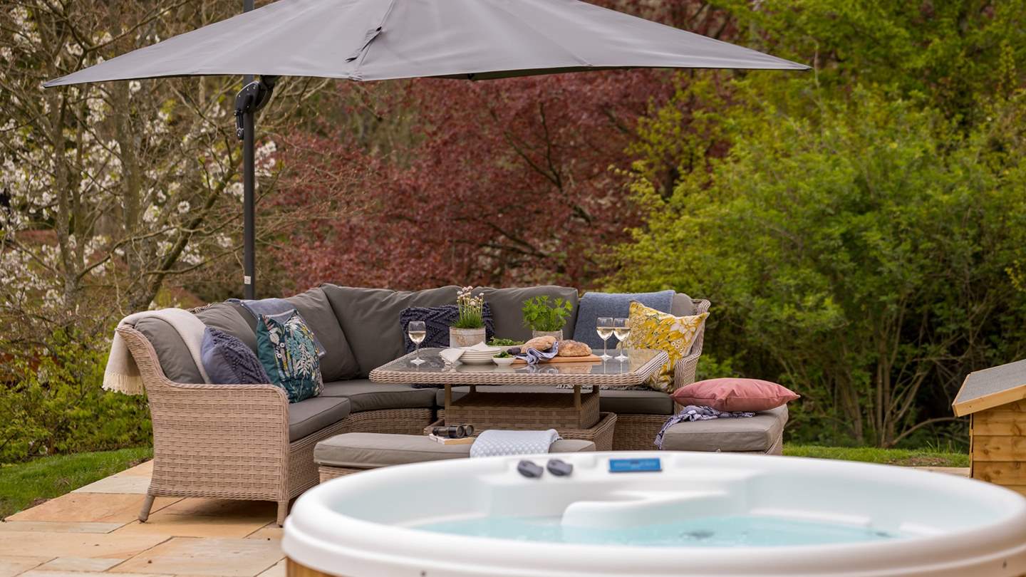 The outside table and chairs, which can be raised or lowered as desired